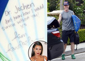 Dr. Stephen Jochen with his Surfboard and Kim Kardashian’s Note