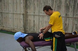 Chiropractor Dr. Michael Douglas with Usain Bolt